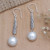 Cultured pearl dangle earrings, 'Innocence and Balance' - Balinese Sterling Silver Dangle Earrings with Grey Pearls