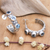 Blue topaz half-hoop earrings, 'Sea Trinity' - Traditional Half-Hoop Earrings with 3-Carat Blue Topaz Gems