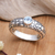 Blue topaz single stone ring, 'Harmonious Ocean' - Single Stone Ring with a Faceted Blue Topaz Jewel from Bali thumbail