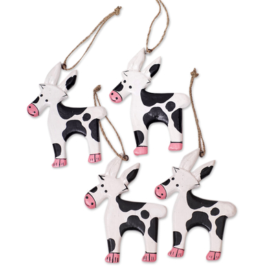 Wood ornaments, 'Winter Cows' (set of 4) - Set of 4 Hand-Painted Cow Ornaments Crafted from Wood