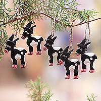 Wood ornaments, 'Night Deers' (set of 5) - Set of 5 Handcrafted Albesia Wood Deer Ornaments in Black