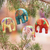 Wood ornaments, 'Happy Trunks' (set of 4) - Handcrafted Elephant Wood Ornaments from Bali (Set of 4) (image 2) thumbail