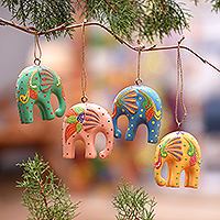 Wood ornaments, 'Sweet Trunks' (set of 4) - Handcrafted Multicolor Elephant Wood Ornaments (Set of 4)