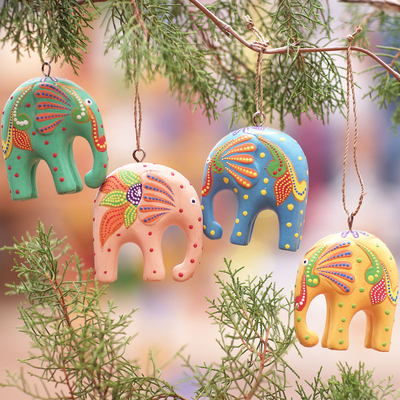 Wood ornaments, 'Sweet Trunks' (set of 4) - Handcrafted Multicolour Elephant Wood Ornaments (Set of 4)