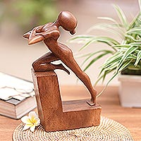 Wood sculpture, 'Free Beauty' - Hand-Carved Brown Suar Wood Sculpture of Flexing Woman