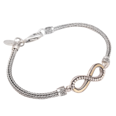 Gold-accented pendant bracelet, 'Infinite Modernity' - 18k Gold-Accented Sterling Silver Infinity Pendant Bracelet