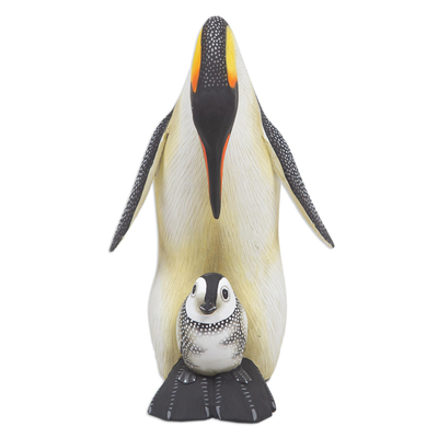 Wood sculpture, 'Penguin Mother and Chick' - Suar Wood Penguin Sculpture Carved and Painted by Hand