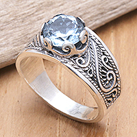 Blue topaz single-stone ring, 'Blue Ties' - Two-Carat Blue Topaz Single-Stone Ring with Windy Pattern