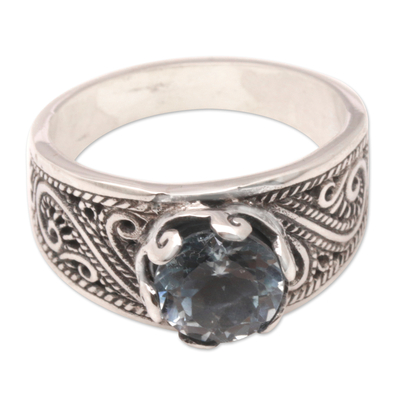 Blue topaz single-stone ring, 'Blue Ties' - Two-Carat Blue Topaz Single-Stone Ring with Windy Pattern