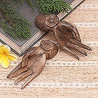 Wood sculpture, 'Passion Hands' (set of 2) - Set of 2 Carved Floral Hibiscus Wood Sculpture of Hands