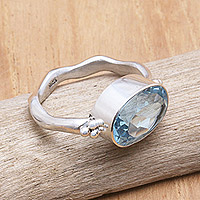 Blue topaz cocktail ring, 'Wavy Azure' - Balinese Sterling Silver Cocktail Ring with Blue Topaz Stone