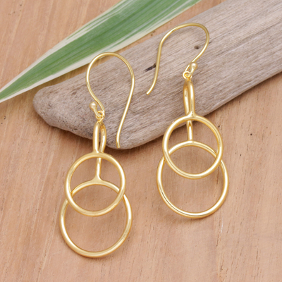 Gold-plated dangle earrings, 'Compassion Rings' - 18k Gold-Plated Abstract Dangle Earrings from Bali