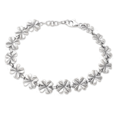 Sterling silver link bracelet, 'Chic Cloverleaf' - Sterling Silver Link Bracelet with Four-Leaf Clover Motif
