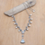 Cultured pearl and blue topaz Y necklace, 'Sea Majesty' - Floral Y Necklace with White Pearls and Blue Topaz Jewel thumbail