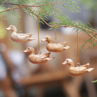 Wood ornaments, 'Swimming Ducks' (set of 4) - Hand-Carved Wood Duck Christmas Ornaments (Set of 4)