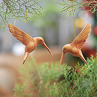 Wood ornaments, 'Lucky Hummingbirds' (pair) - Pair of Hand-Carved Wood Hummingbird Christmas Ornaments