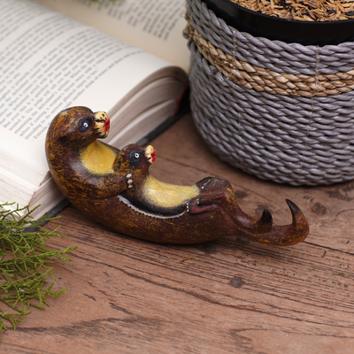 Wood statuette, 'Otter Swing' - Hand-Carved Jempinis Wood Otter Statuette Painted in Bali