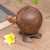 Coconut shell coin bank, 'Prosperous Turtle' - Handcrafted Brown Coconut Shell Turtle Coin Bank from Bali