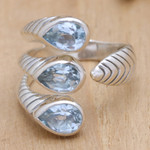 Blue topaz wrap ring, 'Three Times Azure' - Blue Topaz and Sterling Silver Wrap Ring Made in Bali