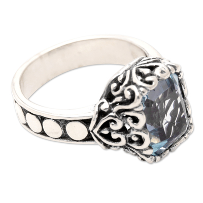 Blue topaz cocktail ring, 'Shimmering Fantasy' - Sterling Silver Cocktail Ring with Faceted Blue Topaz Stone