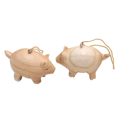 Wood ornaments, 'Chubby Piggies' (pair) - Pair of Wood Pig Ornaments Hand-Carved in Bali