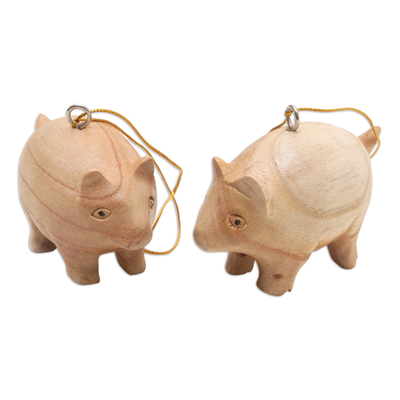 Wood ornaments, 'Chubby Piggies' (pair) - Pair of Wood Pig Ornaments Hand-Carved in Bali