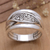 Sterling silver band ring, 'Island Awakening' - Polished Sterling Silver Band Ring with Traditional Motifs (image 2) thumbail