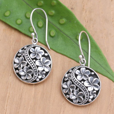 Sterling silver dangle earrings, 'Harmonious Frangipani' - Polished Round Sterling Silver Floral Dangle Earrings