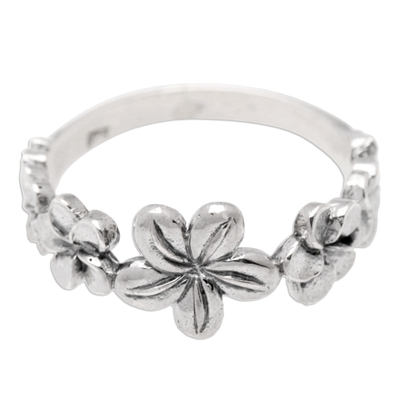 Sterling silver band ring, 'Island Blossom' - Polished Sterling Silver Band Ring with Floral Motifs