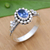 Cubic zirconia cocktail ring, 'Blue Maiden' - Floral Sterling Silver Cocktail Ring with Cubic Zirconia