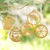 Handcrafted ornaments, 'Cute Celebration' (set of 5) - Gold-Toned Ornaments with Natura Fiber Cords (Set of 5)