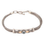 Gold-accented blue topaz pendant bracelet, 'Front to Back in Blue' - Blue Topaz Naga Chain Bracelet with Gold-Accented Pendant