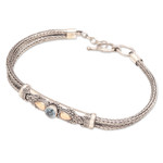 Gold-accented blue topaz pendant bracelet, 'Front to Back in Blue' - Blue Topaz Naga Chain Bracelet with Gold-Accented Pendant
