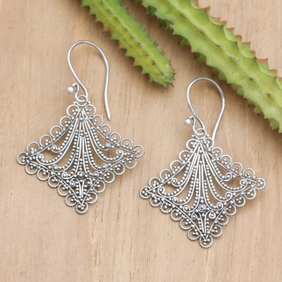 Sterling silver filigree dangle earrings, 'Celestial Gala' - Polished Sterling Silver Filigree Dangle Earrings from Bali