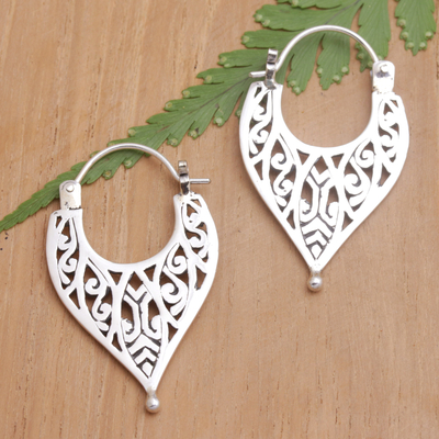 Sterling silver hoop earrings, 'Carved Slingshot' - Sterling Silver Hoop Earrings with Openwork Accents