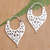Sterling silver hoop earrings, 'Carved Slingshot' - Sterling Silver Hoop Earrings with Openwork Accents (image 2) thumbail