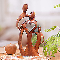 Wood sculpture, 'Beloved Family' - Heart-Themed Family Suar Wood Sculpture Hand-Carved in Bali