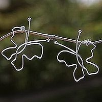 Sterling silver drop earrings, 'Silhouettes of Hope' - Butterfly-Shaped Sterling Silver Drop Earrings from Bali