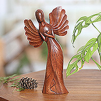 Wood sculpture, 'Angel of Warmth' - Hand-Carved Suar Wood Angel Sculpture from Bali