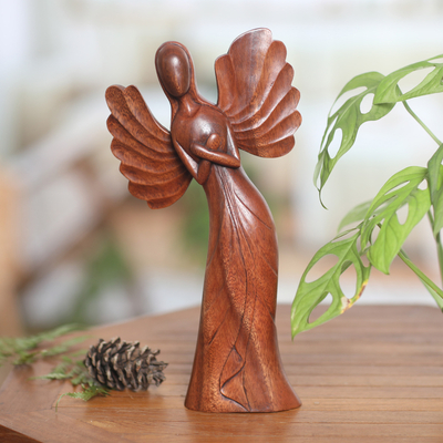 Wood sculpture, Angel of Warmth