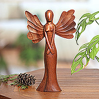 Escultura de madera, 'Ángel de la bondad' - Escultura de madera de Suar tallada a mano de un ángel de Bali