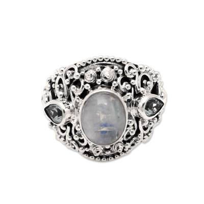 Rainbow moonstone and blue topaz cocktail ring, 'Nirvana Plumeria' - Rainbow Moonstone Blue Topaz and 925 Silver Cocktail Ring