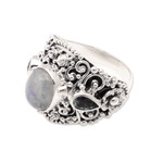 Rainbow moonstone and blue topaz cocktail ring, 'Nirvana Plumeria' - Rainbow Moonstone Blue Topaz and 925 Silver Cocktail Ring