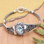 Blue topaz pendant bracelet, 'Penglipuran's Treasure' - Traditional Pendant Bracelet with Faceted 6-Carat Blue Topaz (image 2) thumbail