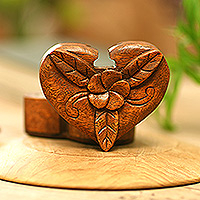 Wood puzzle box, 'Romantic Challenge' - Hand-Carved Floral Hear-Shaped Suar Wood Puzzle Box