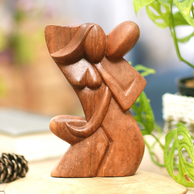 Wood sculpture, 'Comfort Hug' - Hand-Carved Romantic Suar Wood Sculpture of a Couple