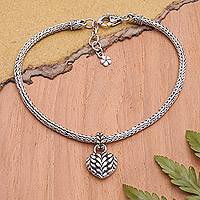 Sterling silver charm bracelet, 'Luminous Romance' - Sterling Silver Bracelet with Heart and Floral Charms
