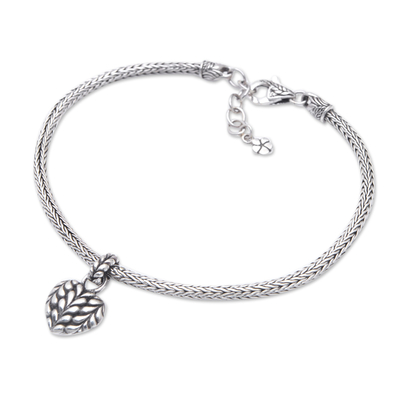 Sterling silver charm bracelet, 'Luminous Romance' - Sterling Silver Bracelet with Heart and Floral Charms