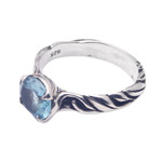 Blue topaz single stone ring, 'Marine Gem' - Ocean-Themed Sterling Silver Ring with Faceted Blue Topaz