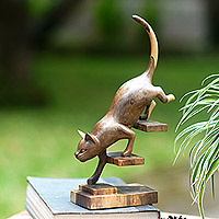 Wood sculpture, 'Feline Acts' - Hand-Carved Modern Hibiscus Wood Sculpture of a Cat